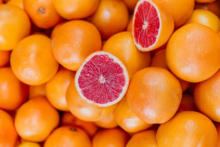 Heap Of Grapefruits For Sale At The Farmer's Market, Full Frame Shot